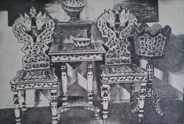 Photograph of a collection of gorgeously painted furniture