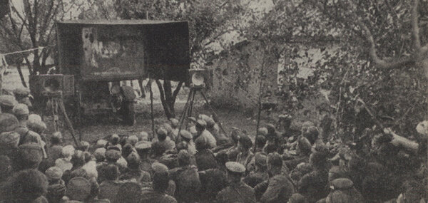 Daytime movies being shown to Red Army men quartered in a village at the front.