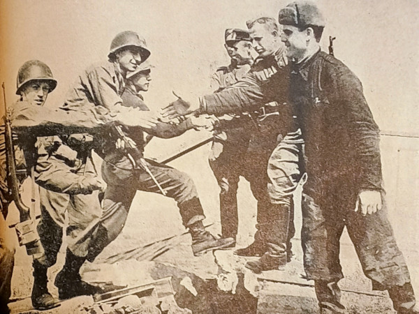 Photograph of soldiers meeting